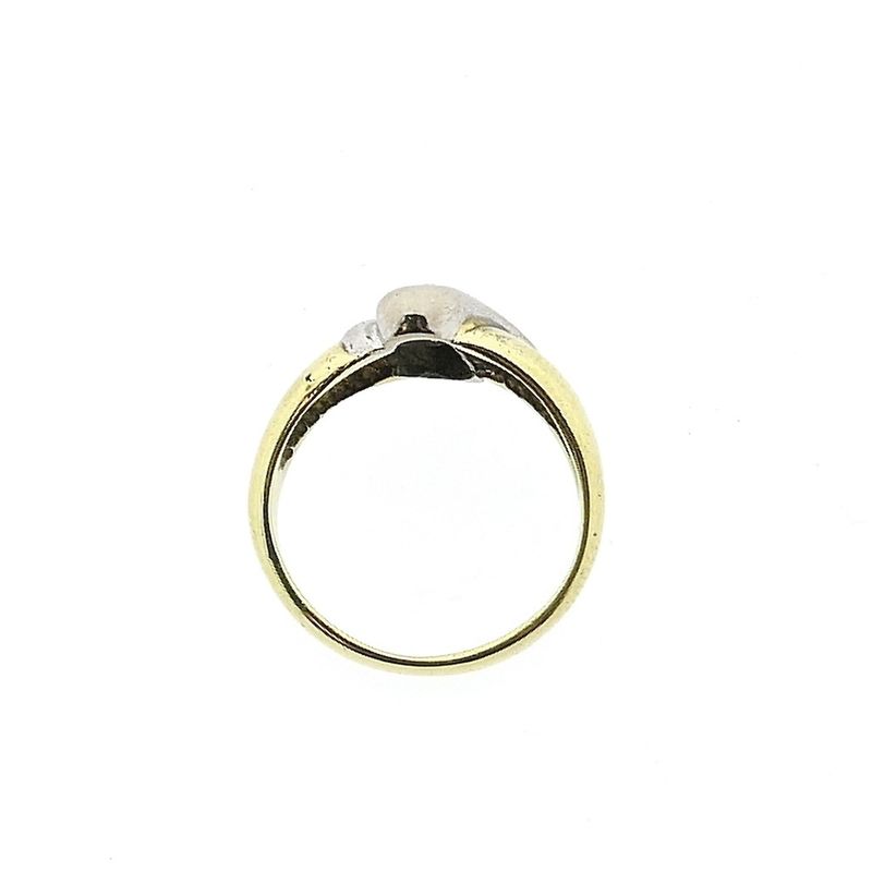 Image 5 of Two-tone gold solitaire ring with 0.105 ct diamond.