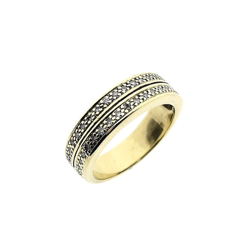 Image 1 of Gold ring with 0.20 ct diamond.