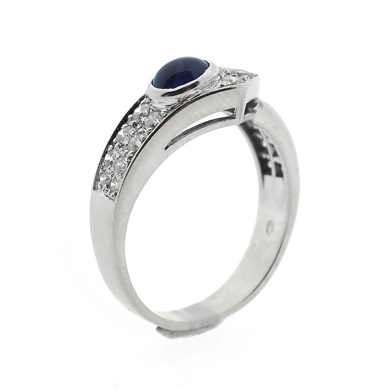 Image 1 of White gold ring with sapphire and diamonds 0.61 ct.