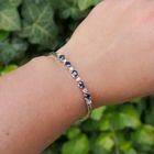 Image 11 of White gold cobra link bracelet with sapphire and diamond; 0.24 ct.