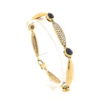 Gold fantasy link bracelet with sapphire and diamonds; 0.93 ct.