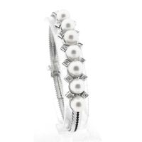 Witgouden visgraat schakelarmband met diamanten; 0,24 ct. | 19,5 cm 