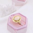 Image 6 of Gold ring set with angel skin coral