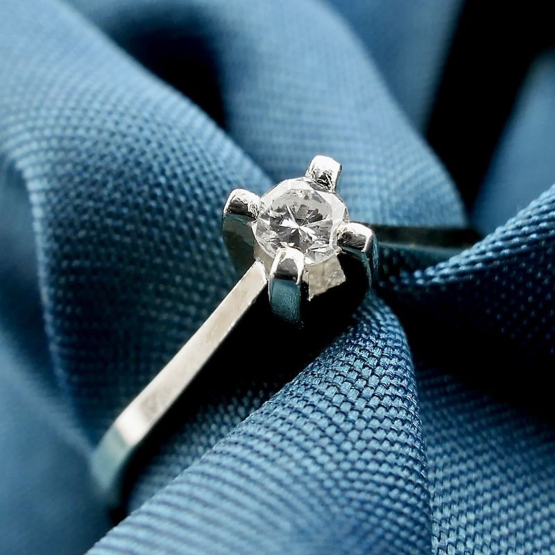 Image 7 of White gold solitaire ring with diamond | 0.10 ct.