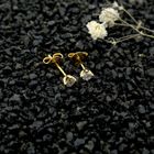 Image 2 of Gold solitaire stud earrings with diamonds; 0.12 ct.