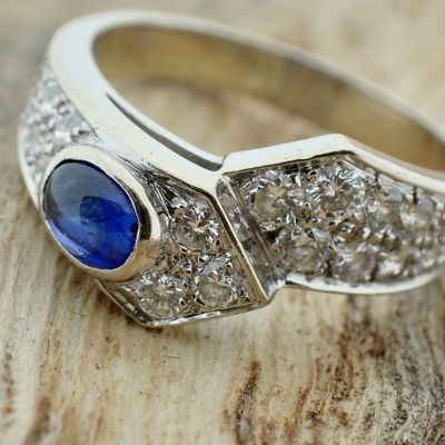 Image 2 of White gold ring with sapphire and diamonds 0.61 ct.