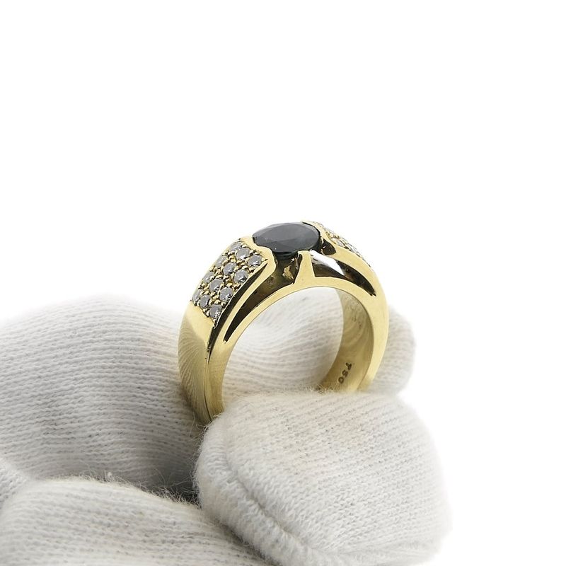 Image 8 of Gold ring with sapphire and diamond; 0.48 ct.