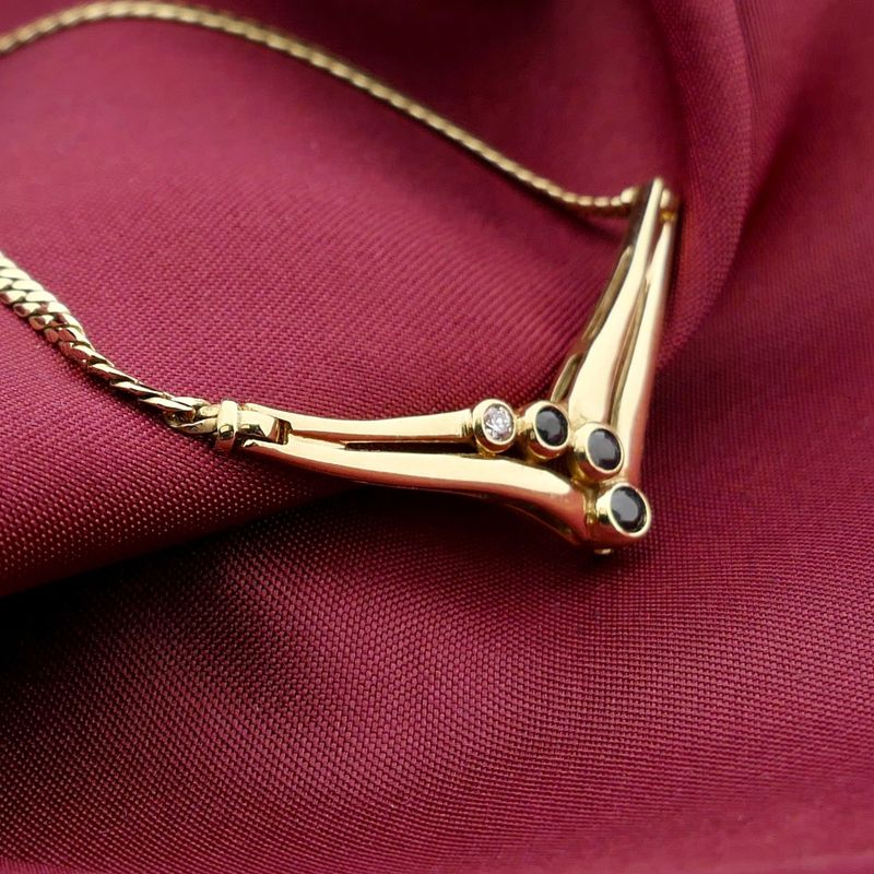 Image 2 of Gold necklace with fixed pendant, sapphire and diamond; 0.02 ct.