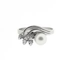 Image 5 of White gold ring with pearl and diamonds | 0.0015 ct.