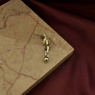 Image 2 of Gold pendant of a football player