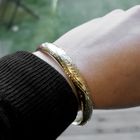 Image 10 of Gold slave bracelet with engravings; Size M