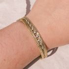 Image 8 of Gold herringbone link bracelet with diamonds; 0.21 ct.