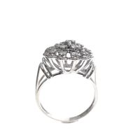 18 carat white gold cocktail ring with 0.66 ct diamond.