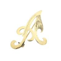 Gold letter brooch; letter A