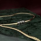 Image 2 of Gold necklace with fixed pendant and diamond; 0.21 ct.