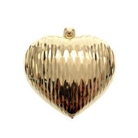 Silver pendant of a large gold-plated heart