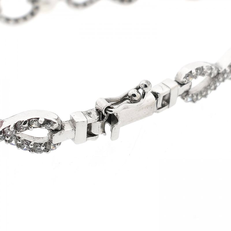 Afbeelding 3 van Witgouden infinityschakel armband met parel en zirconia | 19,5 cm
