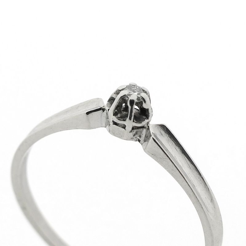 Image 5 of White gold solitaire ring with 0.02 ct diamond.