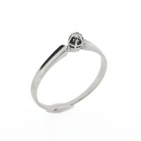 White gold solitaire ring with 0.02 ct diamond.