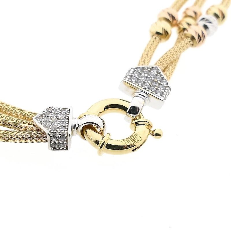 Afbeelding 4 van Tricolor gouden schakelarmband met zirconia