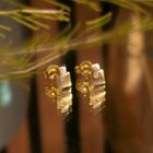 Image 2 of Bicolor gold stud earrings with zirconia