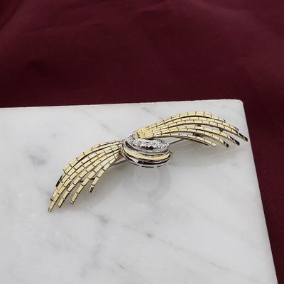 Afbeelding 2 van Bicolor gouden broche met diamanten; 0,60 ct.
