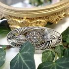 Image 2 of Silver brooch in floral design