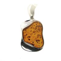 Silver pendant with amber