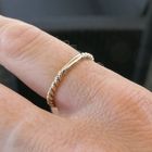 Image 8 of Two-tone gold twisted sliding ring