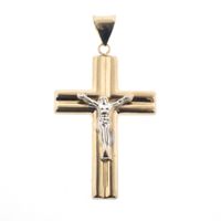Two-tone gold pendant of a cross with corpus