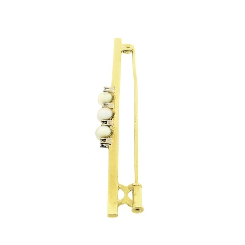 Image 5 of Golden long narrow brooch with pearl and diamonds; 0.10 ct.