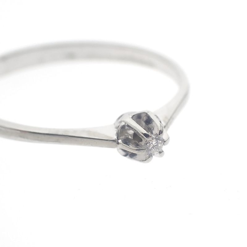 Image 7 of White gold solitaire ring with 0.03 ct diamond.