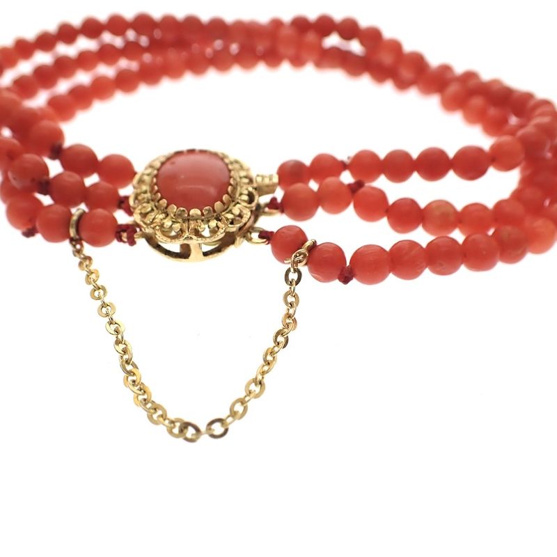Image 1 of Blood coral bead bracelet with gold clasp