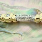 Image 14 of Two-tone gold fantasy link bracelet with diamonds; 2.85 ct.