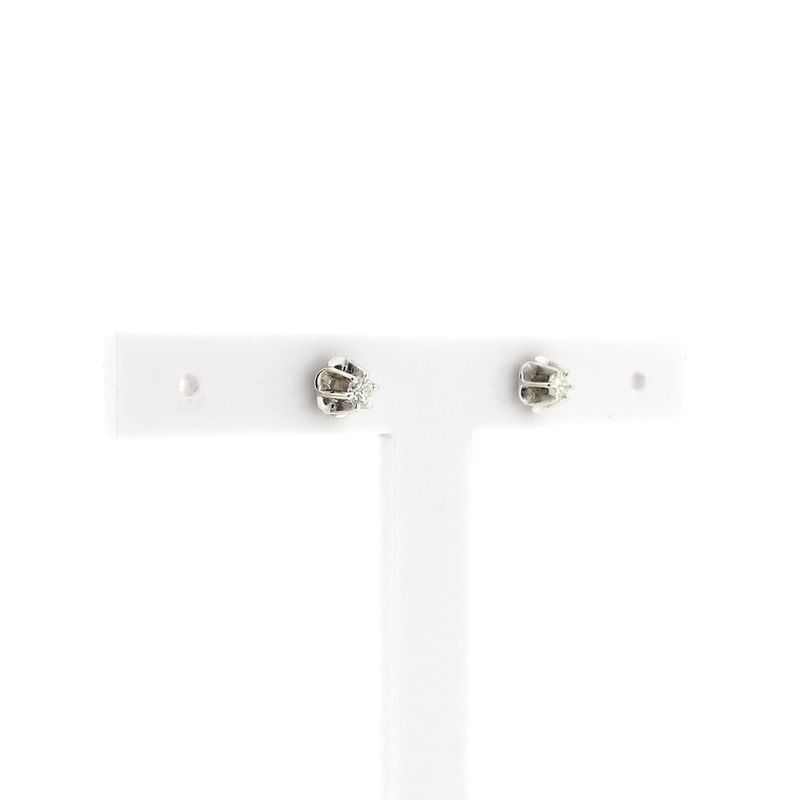 Image 3 of White gold solitaire stud earrings with diamond; 0.14 ct.