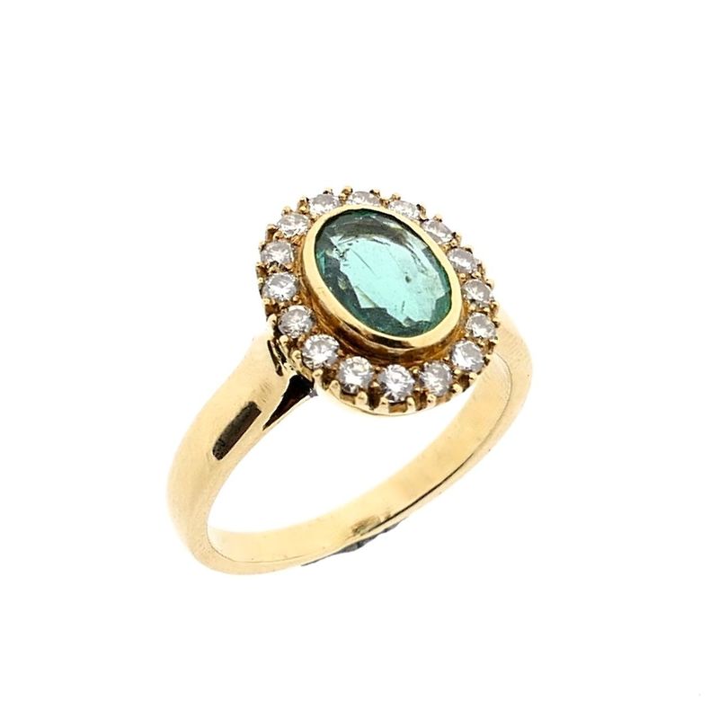 Image 1 of Gold ring with emerald and diamonds; 0.32 ct.