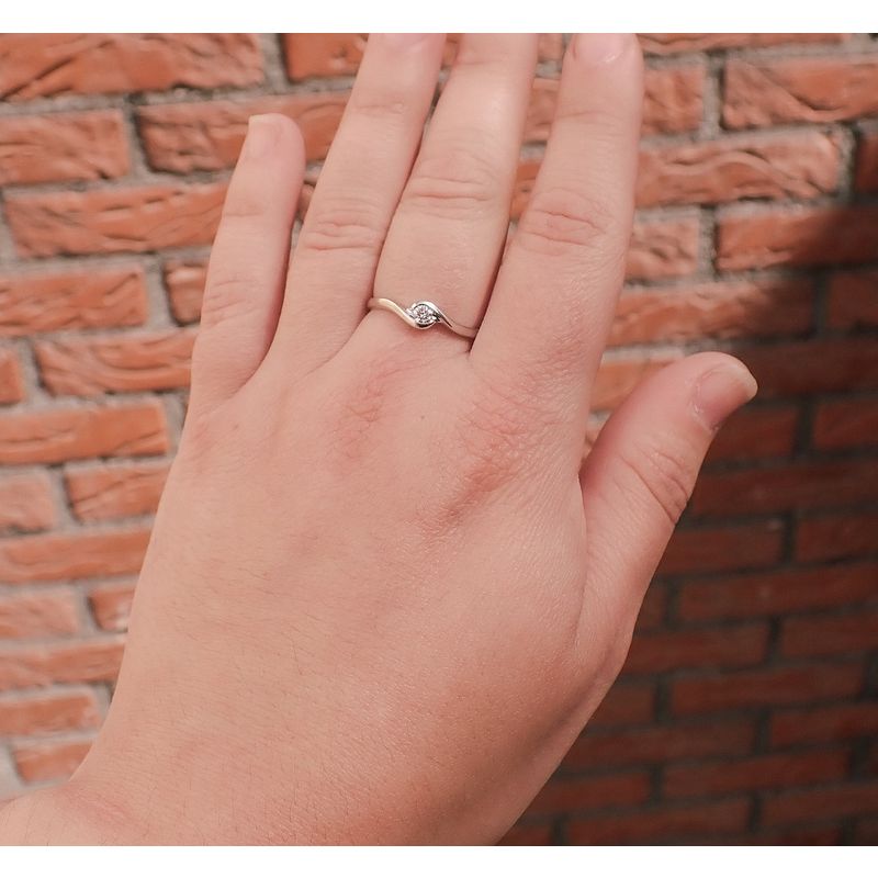 Image 4 of White gold solitaire ring with 0.18 ct diamond.