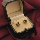 Image 2 of Gold stud earrings as a button