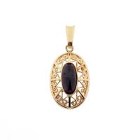 Gold pendant with garnet