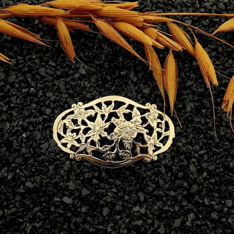 Image 11 of Vintage gold brooch with a floral design