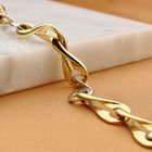 Afbeelding 2 van Bicolor gouden infinity schakelarmband