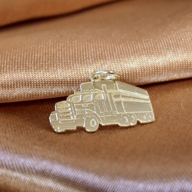 Image 2 of Gold pendant of a truck