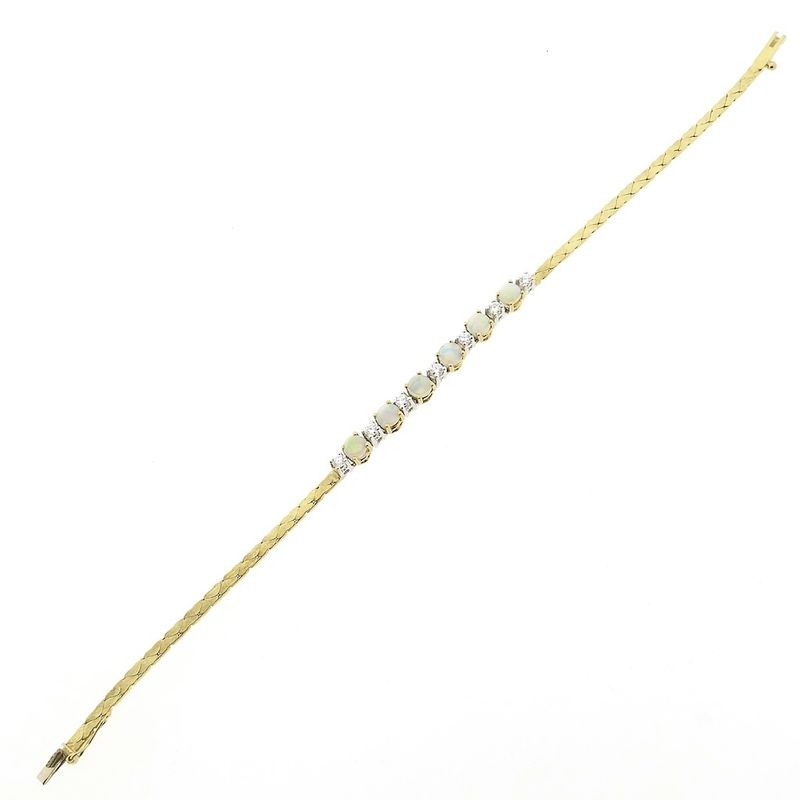Image 3 of Gold cobra link bracelet with opal and diamond; 0.24 ct. | 17 cm