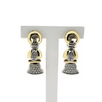 Bicolor gold earrings with diamonds; 0.75 ct.