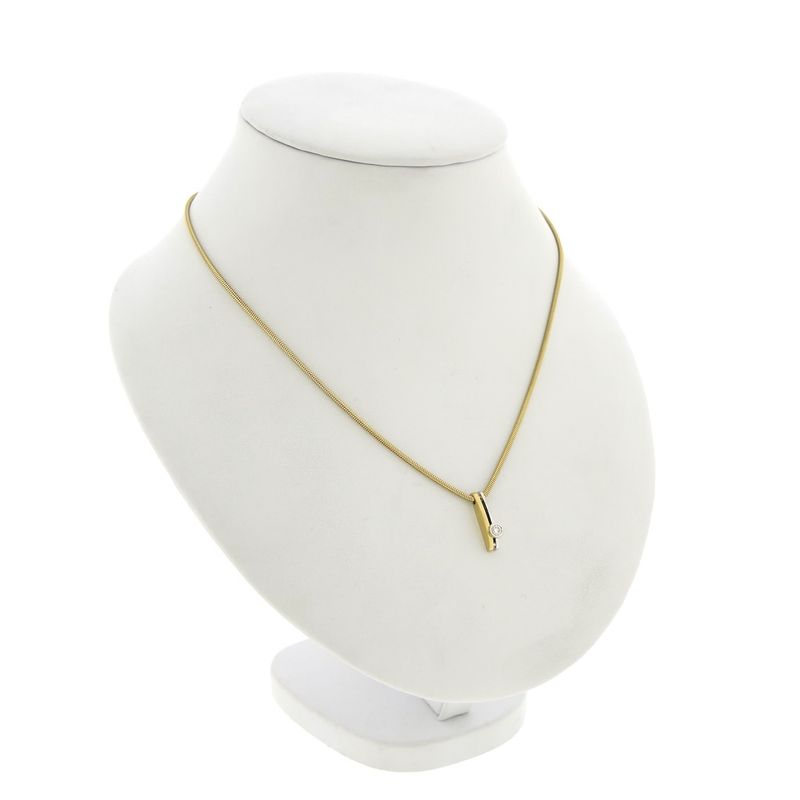 Image 3 of Two-tone gold necklace with fixed pendant and diamond; 0.10 ct.