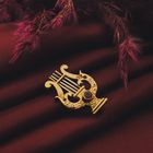 Image 2 of Gold brooch of a lyre harp with ruby