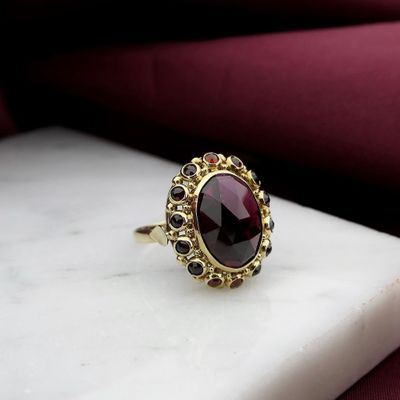 Image 2 of Vintage gold entourage ring with garnet