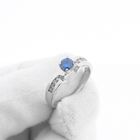 Image 9 of White gold solitaire ring with white and blue diamonds; 0.74 ct.