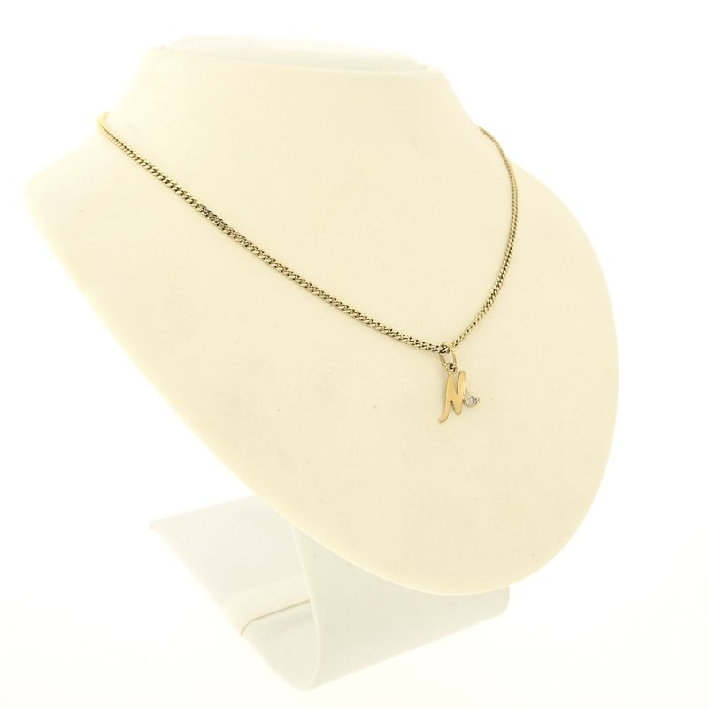 Image 6 of Gold pendant of the letter M with diamond | 0.015 ct.