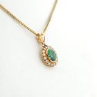 Image 7 of Gold pendant with emerald and diamonds; 0.32 ct.